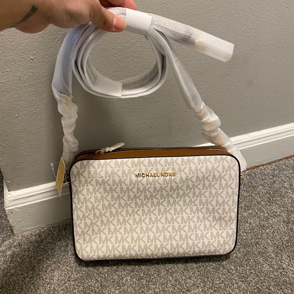 Michael Kors Handbags - Michael kors jet set logo vanilla crossbody bag